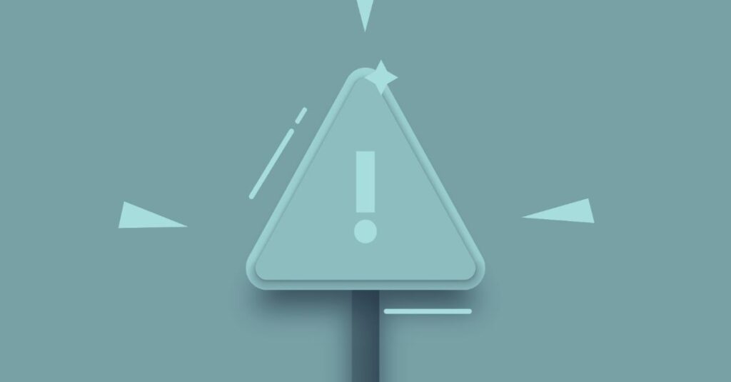 Illustration eines stilisierten Warnschilds mit Ausrufezeichen vor blauem Hintergrund – symbolisch dafür, dass Unternehmensrisiken 2026 für österreichische KMU sichtbar gemacht und aktiv gemanagt werden müssen.